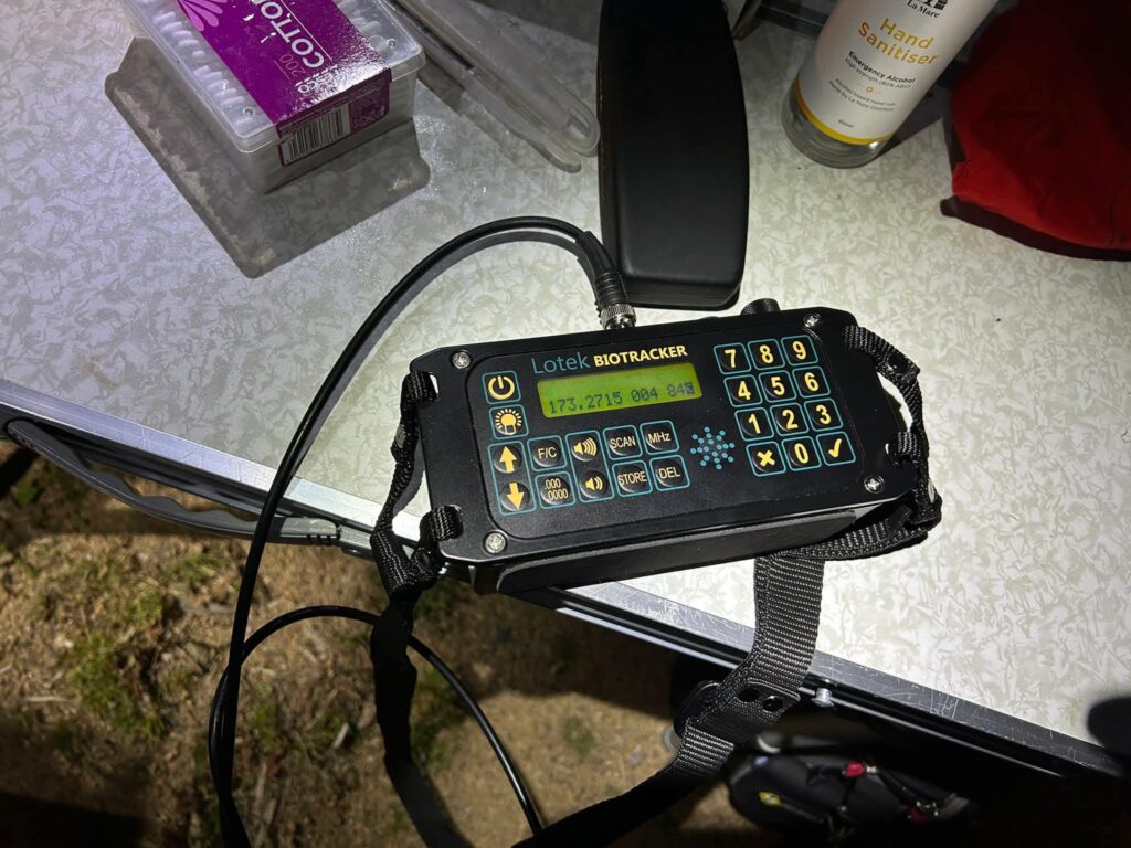 Biotracker device on table with accessories.